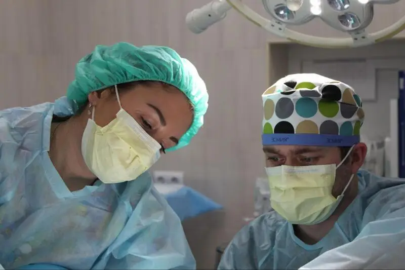 Doctors performing treatment