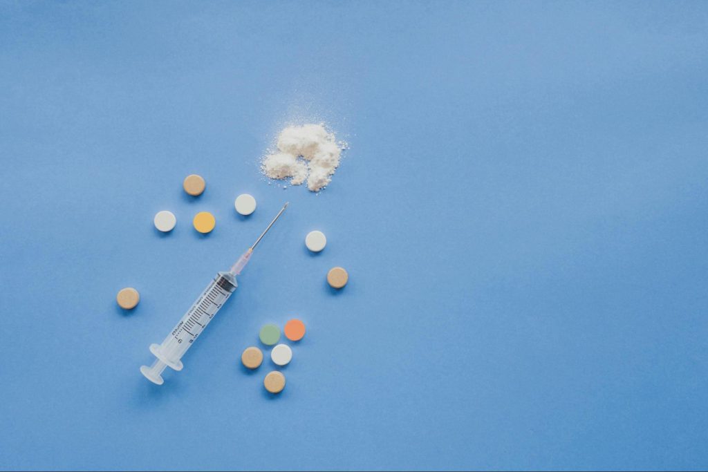 A combination of synthetic opioids on a blue surface
