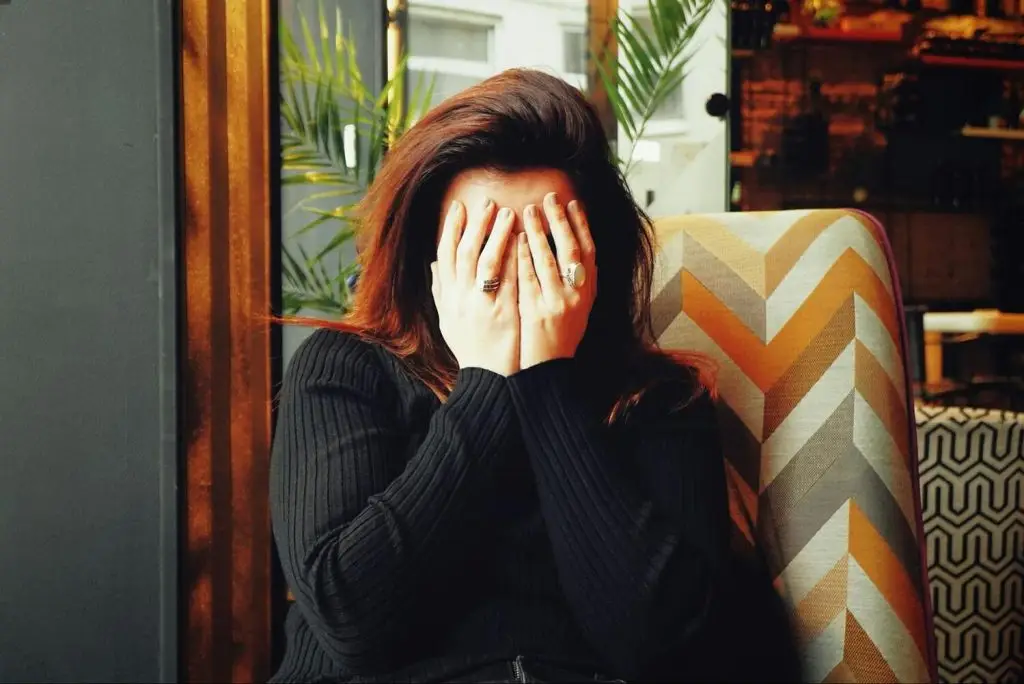 A woman experiencing a headache